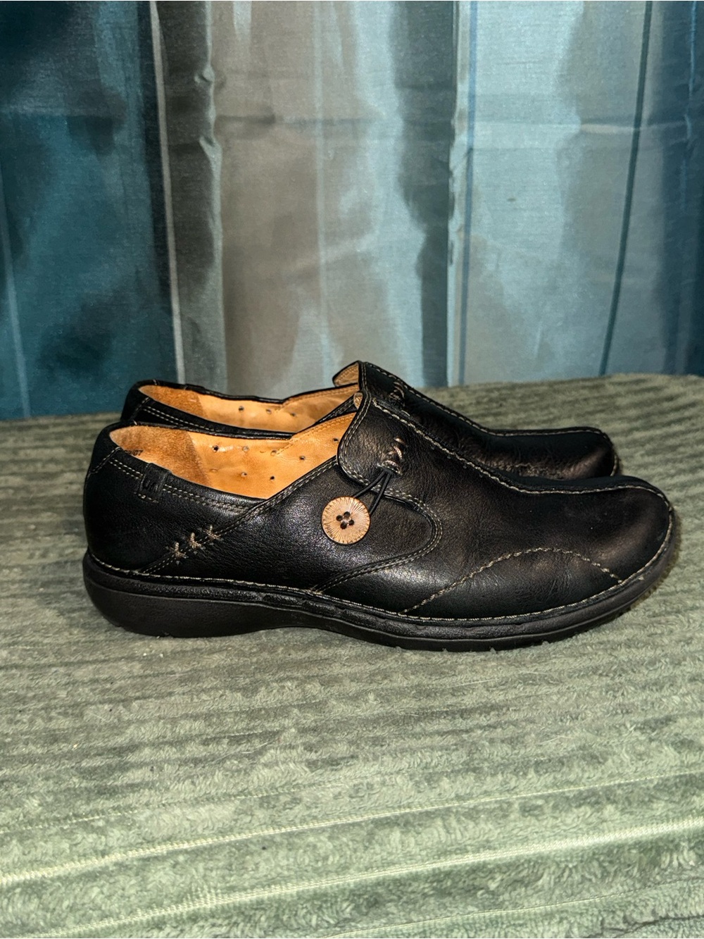 Clarks Black Leather Slip-On Loafers with Button Accent